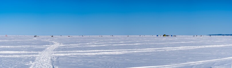 Winter sea covered with ice. Panorama