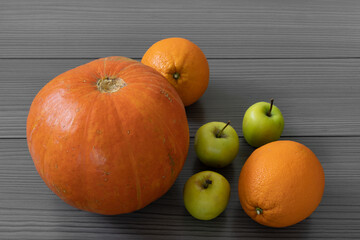 Pumpkin, orange and apples.