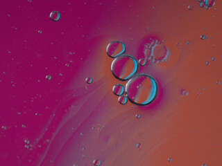 Background of colorful oil drops in water