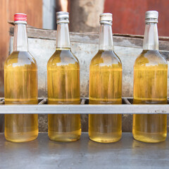 Glass bottles of gasoline.