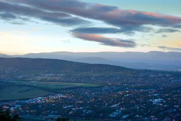 Panorama of city on the hills