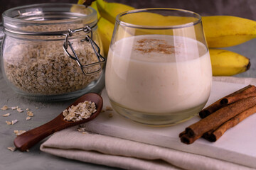 A nutritious banana honey cinnamon smoothie.
Close-up.