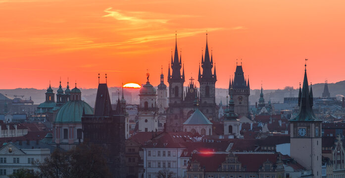 sunrise over the prague old town - prague towers