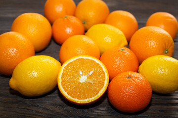 Fresh citrus fruit on a brown background