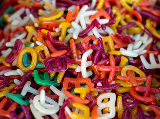 Fototapeta premium Alphabet shaped Fryums Papad in the market