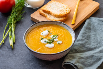 Creamy pumpkin soup with vegetables and spices.