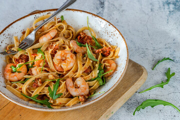 Tiger prawns in tomato, chilli and almond pesto