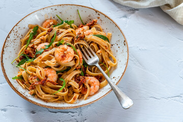 Tiger prawns in tomato, chilli and almond pesto