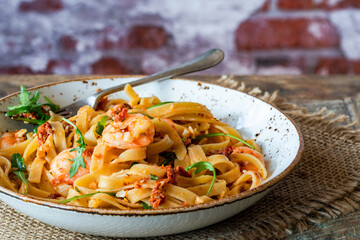 Tiger prawns in tomato, chilli and almond pesto