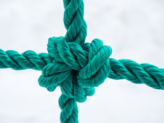 A knot on a thick green nylon rope