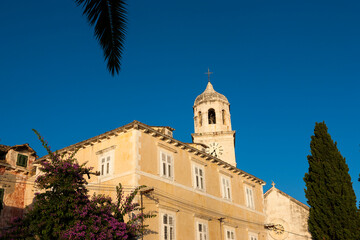 Fototapeta premium Houses and the belltower of St. Nicholas' church, Cavtat, Dubrovnik-Neretva, Croatia