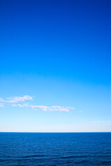 Seascape with sea horizon and blue sky