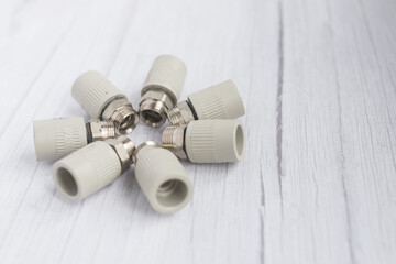 Combined couplings for connecting metal and polypropylene water pipes