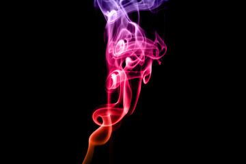 Abstract color smoke isolated on black background, with copy space