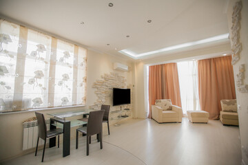 The interior of a modern apartment after renovation. Presentation of the apartment in light warm tones