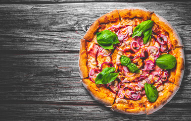 Pizza with chicken and barbeque sauce. Italian pizza on wooden table background