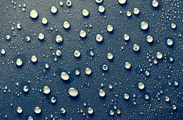 Water drops on blue background.