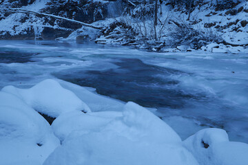 blue river in winter long exposure