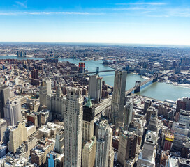 Aerial view of New York City with Manhattan skyscrapers and streets and Manhattan and Brooklyn bridge