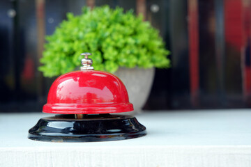 Desk bell push trigger ,reception bell on the white table couter.