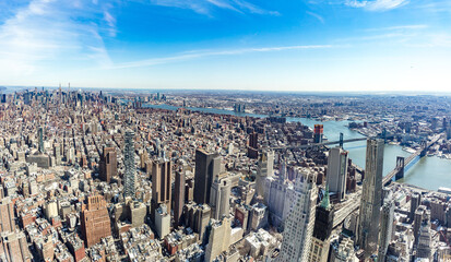 Aerial view of New York City with Manhattan skyscrapers and streets and Manhattan and Brooklyn bridge