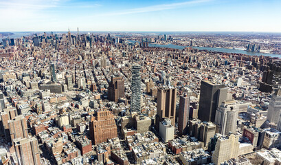 Aerial view of New York City Manhattan  with skyscrapers and streets.