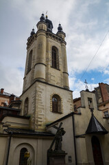 Fototapeta na wymiar View on bell tower of Armenian Cathedral of the Assumption of Mary in Lviv, Ukraine