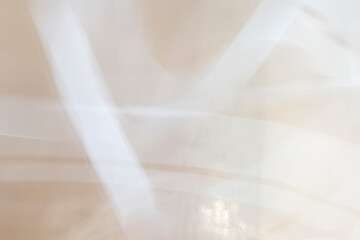 Blurred light, white background. Light beams. 