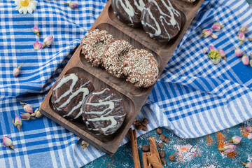 Chocolate anc sesame cookies in a wooden platter