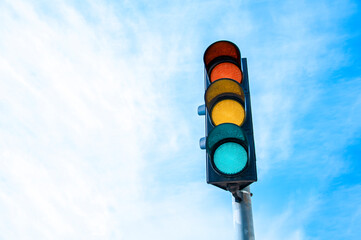 Traffic light and sky.