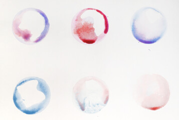 water colour circles in blue and pink colours on white paper background