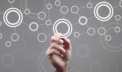 Businessman draws a flowchart of the program.