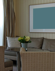 Living room of balcony suite cabin stateroom in clean modern cozy interior design with desk, arm...