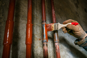 paint the pipe red with a brush and wear gloves