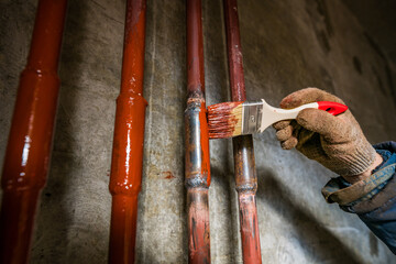 paint the pipe red with a brush and wear gloves