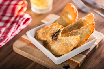 Meat pastry. Traditional Brazilian snacks. Image with selective focus.