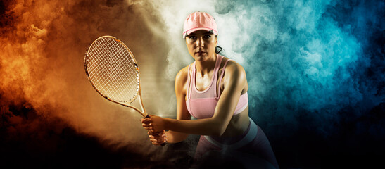 Female tennis player on smoke background