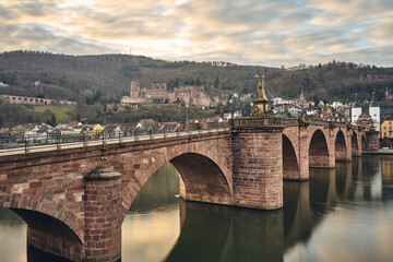 Old bridge with castle in Heidelberg at a sunrise. Karl Theodor Bridge