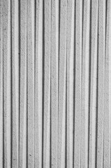 The background is made up of three-dimensional vertical lines. Hintergrund aus plastisch wirkenden...