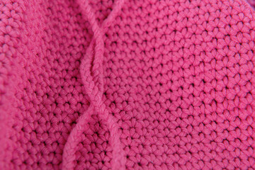 Close up of pink cotton cord on grey background. Cotton lace.