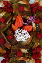 Zen sesshin (retreat) in Tamie, France. Close-up of cake with fruit and flowers. 21.09.2018