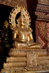 Fototapeta premium Buddha statue in Wat Chedi Luang, Chiang Mai. Thailand. 25.02.2017