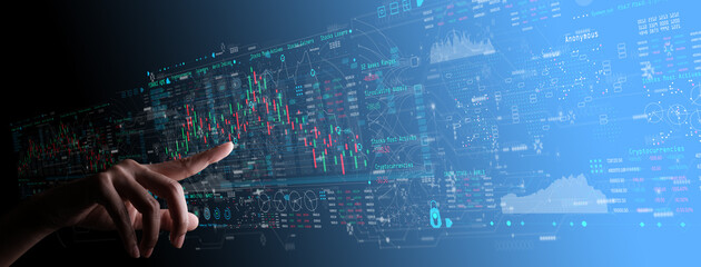 Businesswoman hand working with digital computer touch screen with Finance Content marketing  concept on dark blue background.