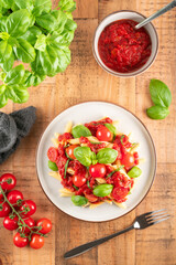 Top down tomato and basil pasta