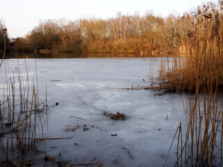 frozen lake with ice cover