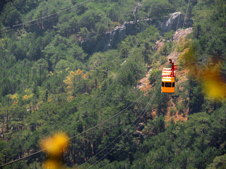 Climbing the cable car in the mountains