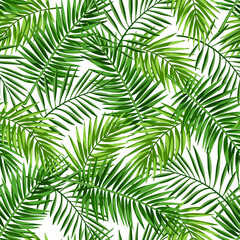 Vector tropical seamless pattern with green palm leaves on a white background.