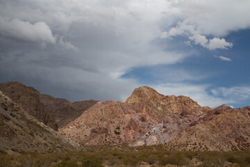 The arid desert and rocky sierra. View of the sand, sandstone and colorful rocky formation in Mendoza, Argentina. 