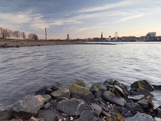 View of the old town with the promenade in the city of Dusseldorf from the bank river Rhine....