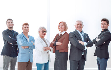 Group of business people in an office lined up
